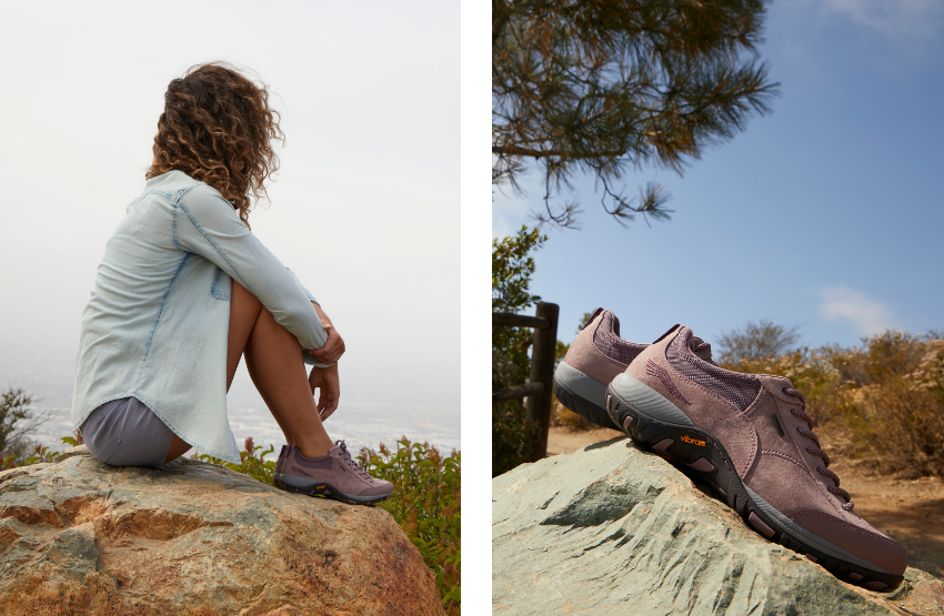 Woman sitting on rock 