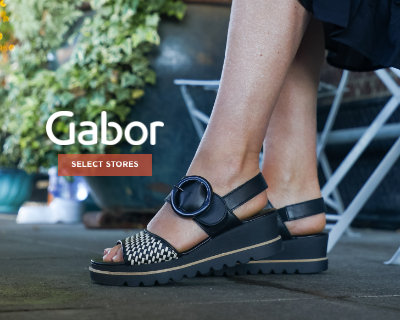 Woman sitting in chair wearing Gabor