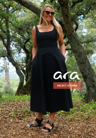 Woman wearing Ara wedges at winery