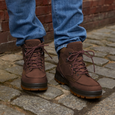 Man standing on sidewalk