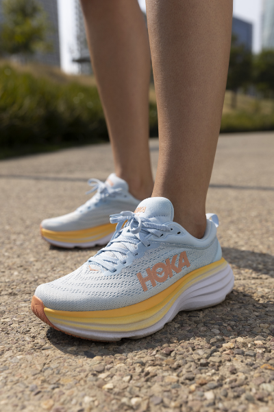 Woman standing in Hoka 