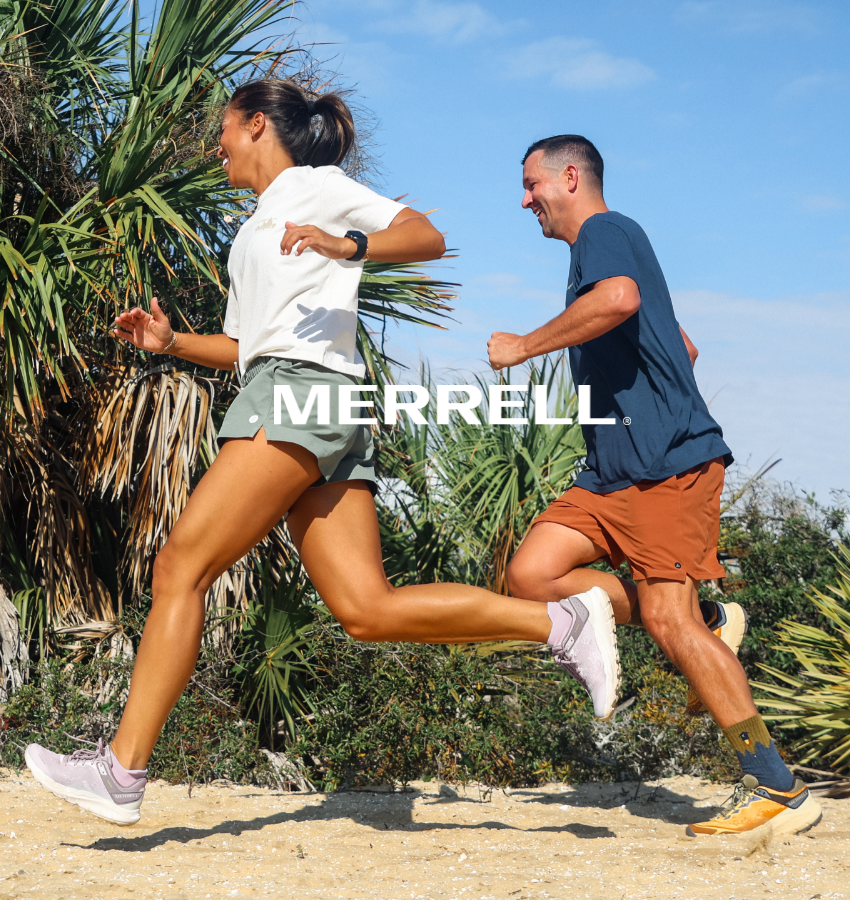 Man and woman running in Merrell shoes