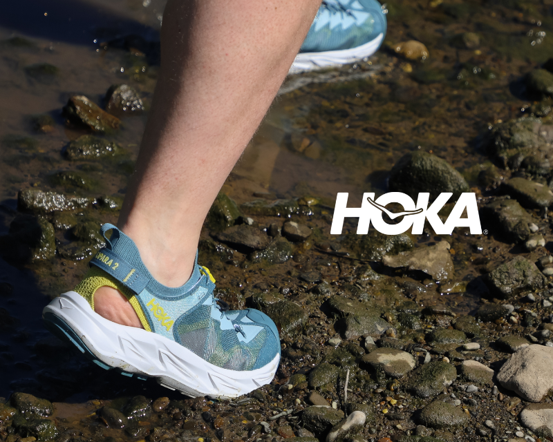 Man wearing Hoka water shoes