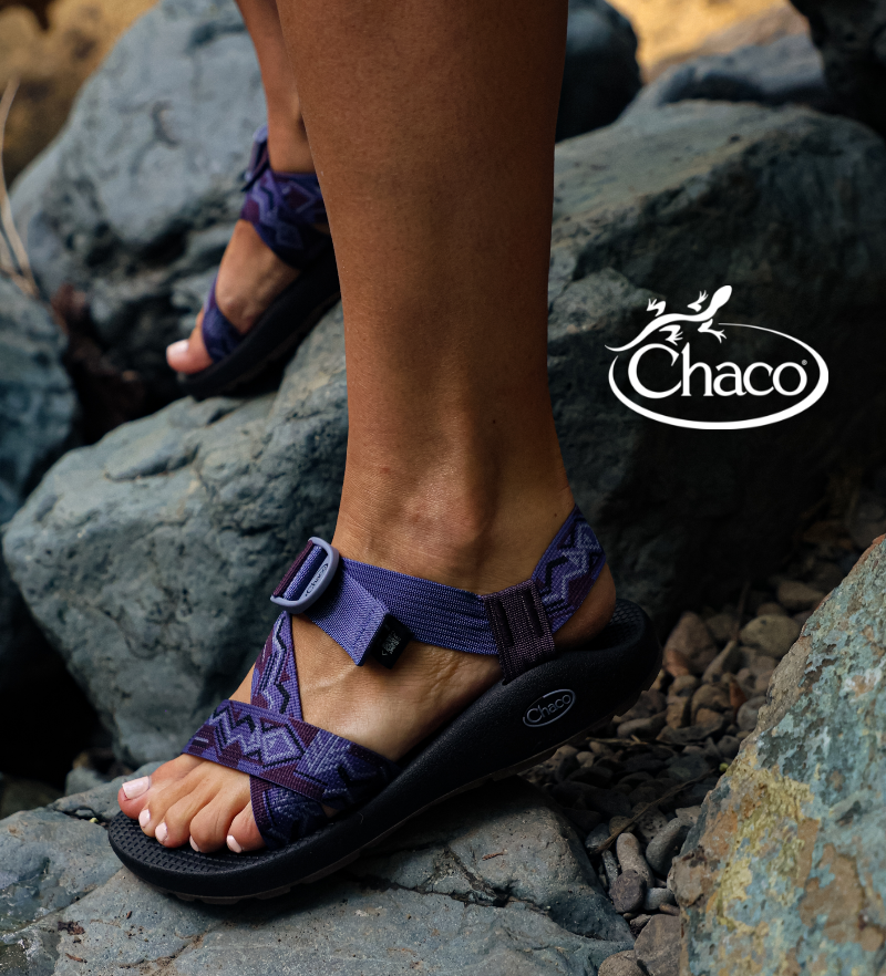 Woman wearing Chaco sandals on hike