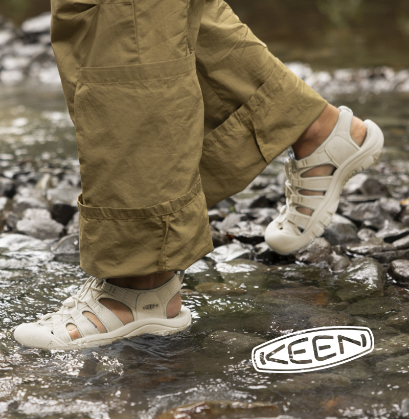 Woman wearing Keen in river