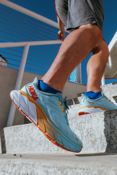 Man running up stairs outside