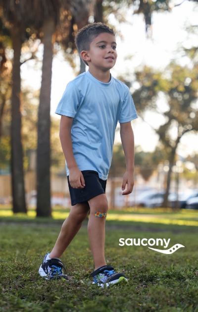 Kid wearing Saucony
