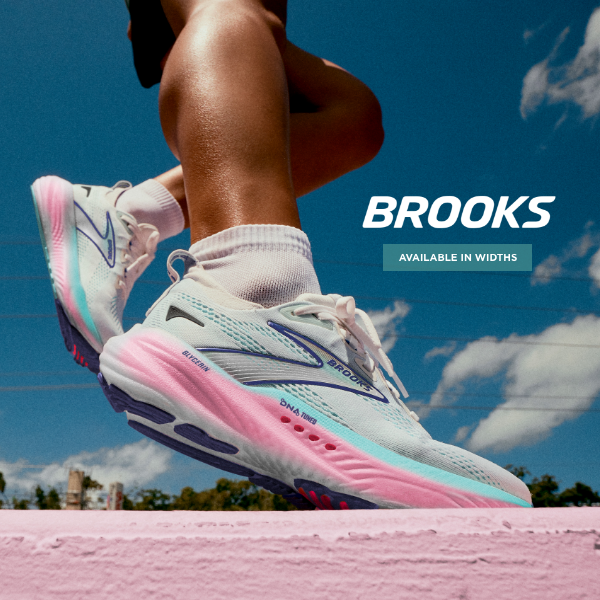 Woman stepping onto sidewalk in Brooks Glycerin 22s