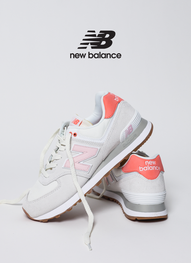 New Balance 574 sneakers on white background