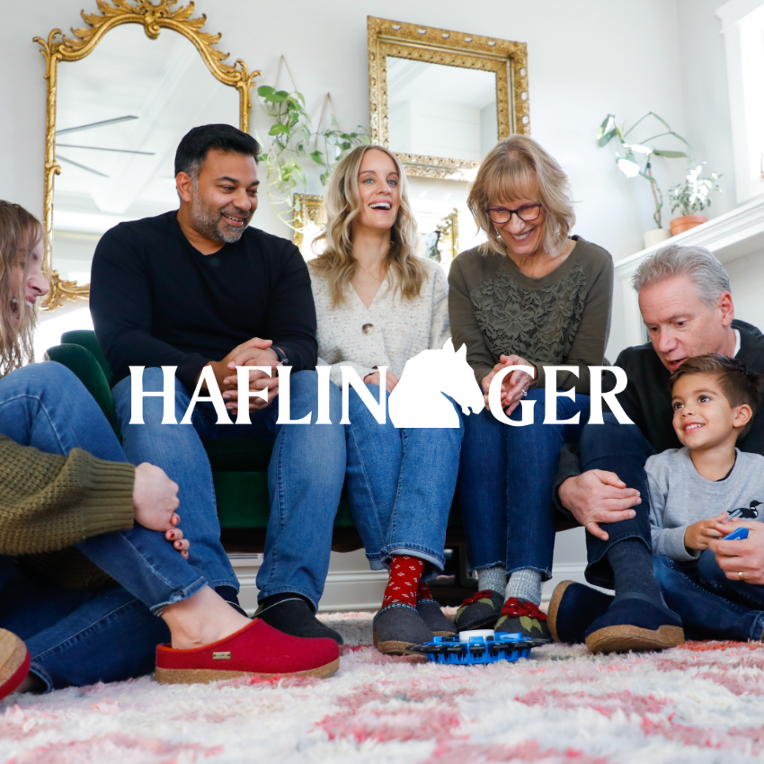 Family playing game wearing Haflinger