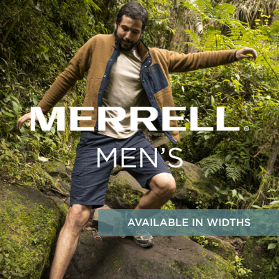 Man climbing down rocks