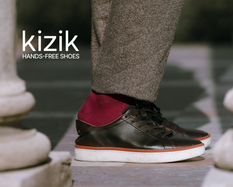 Man stepping into Kizik sneakers