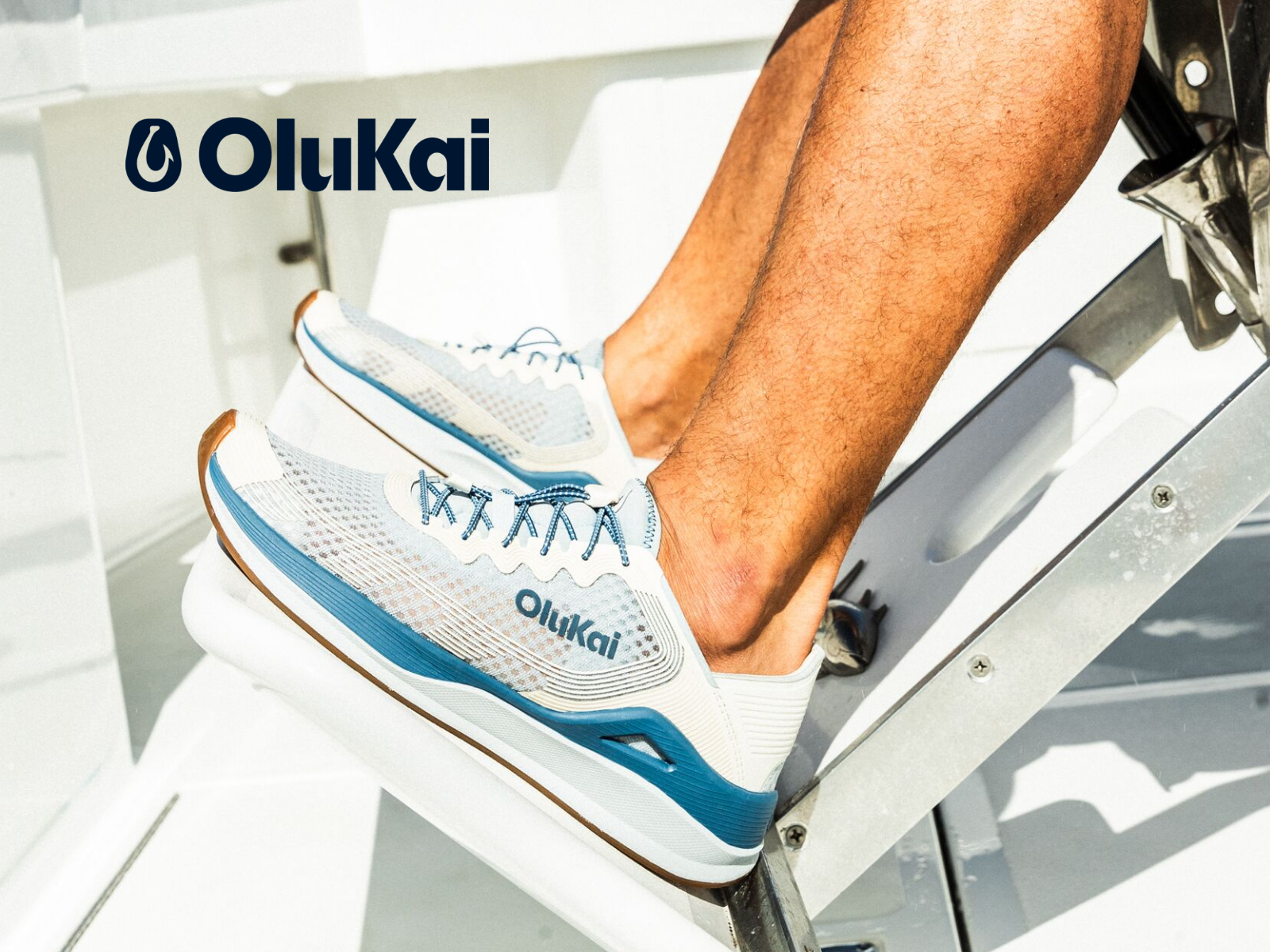 Man fishing in Olukai shoes