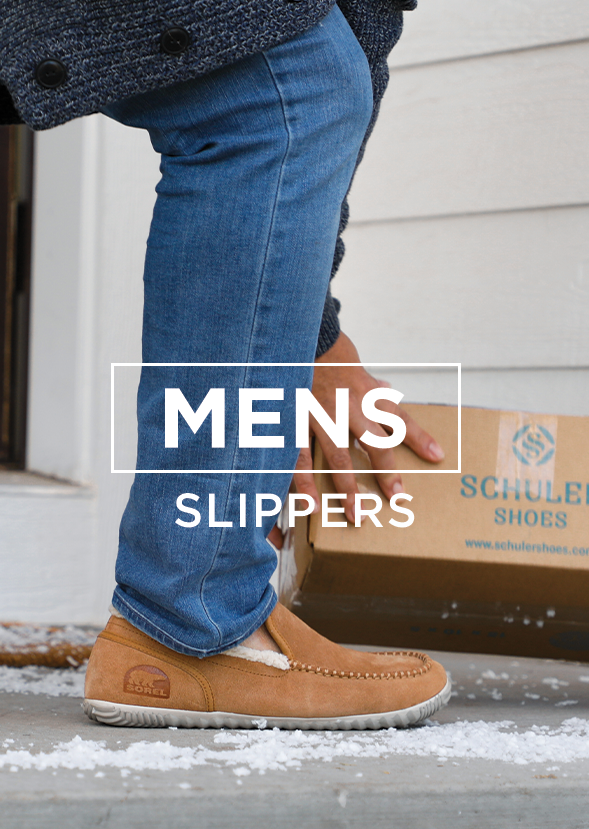 Man getting box from front porch in slippers