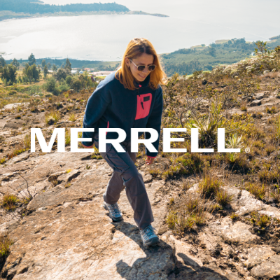 Woman hiking up trail