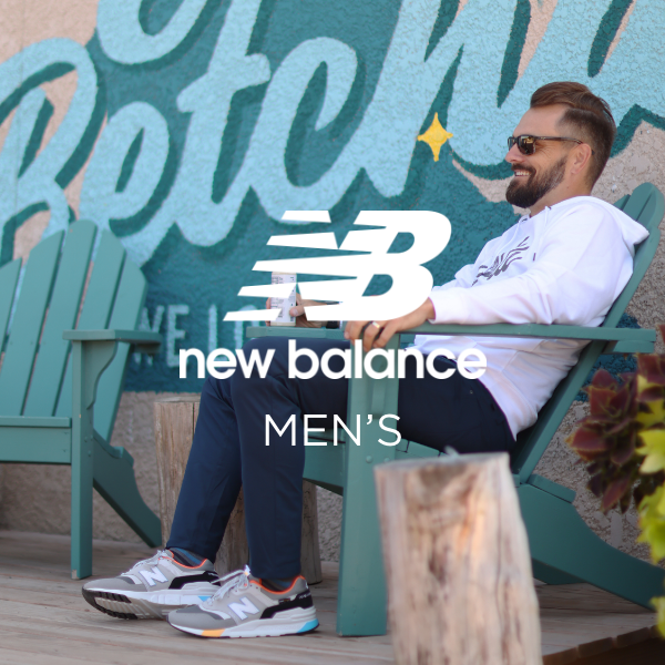 Man sitting in chair in New Balance 