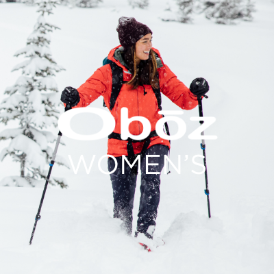 Woman walking through snow