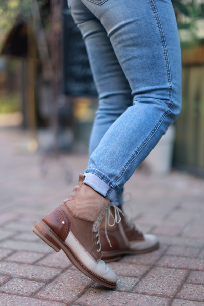Woman stopping and posing in Pikolinos boots 