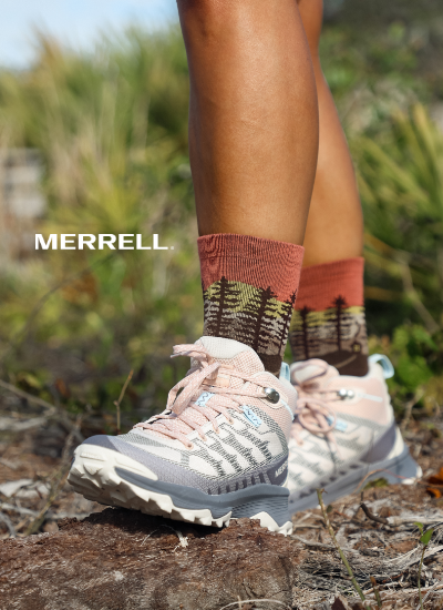 Woman walking on trail in Merrell 