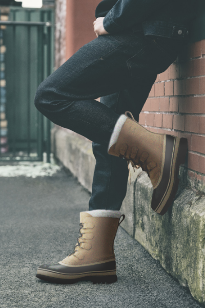 Man leaning against wall