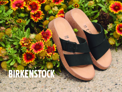 Birkenstock sandals leaning against flowers