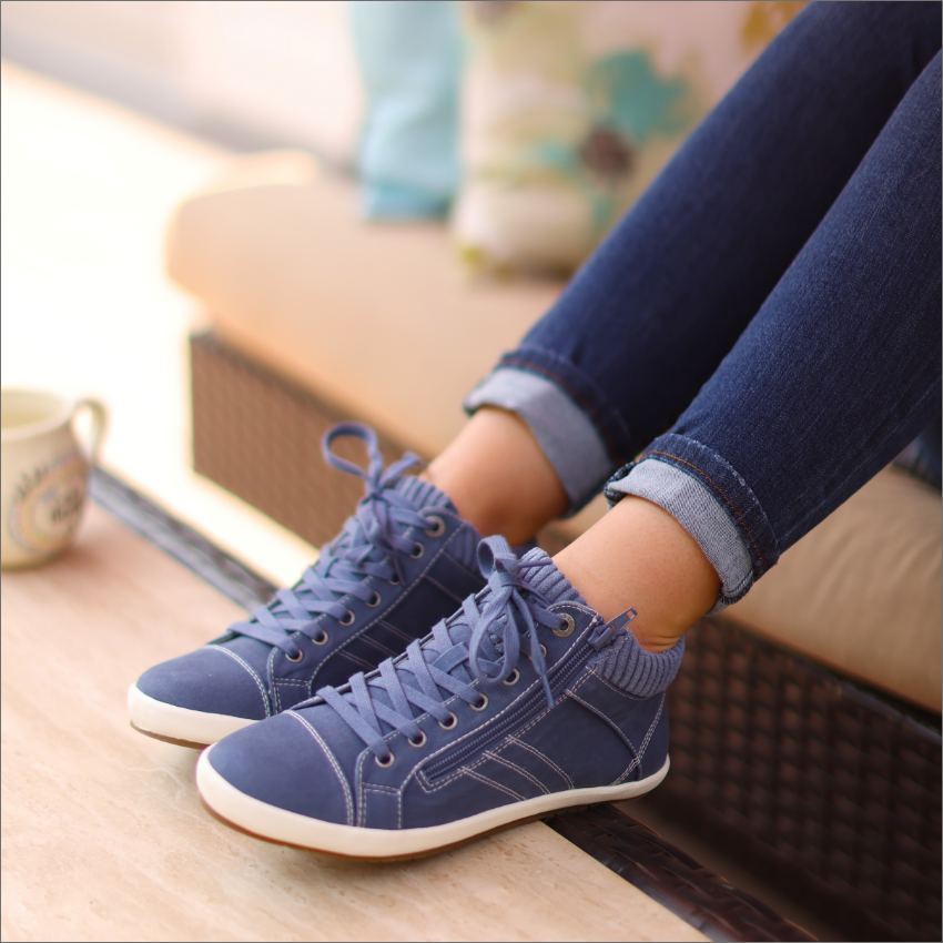 Woman sitting in Taos shoes