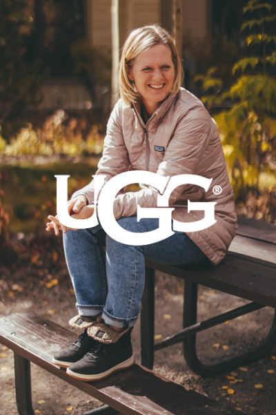 Woman sitting on picnic table 