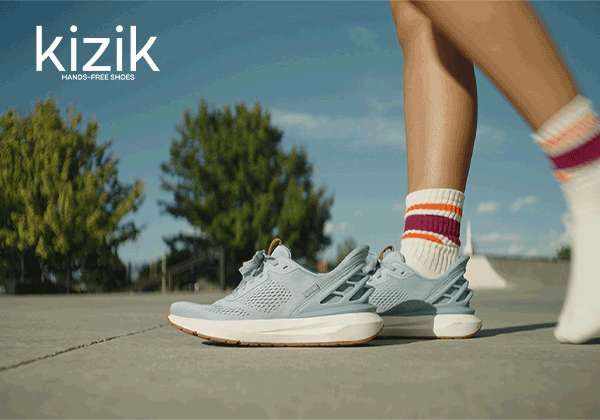 Woman slipping on Kizik sneakers
