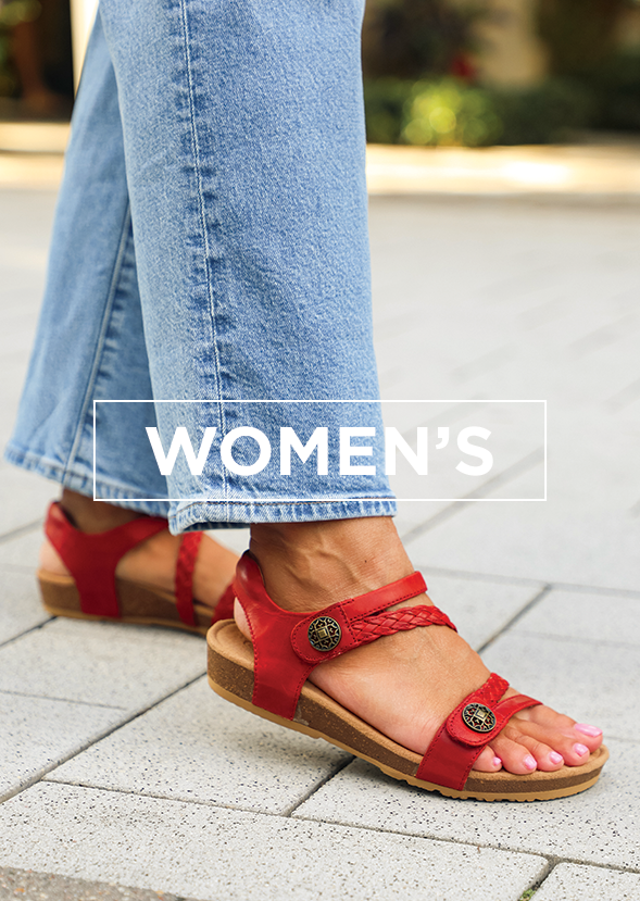 Woman wearing sandals taking a step