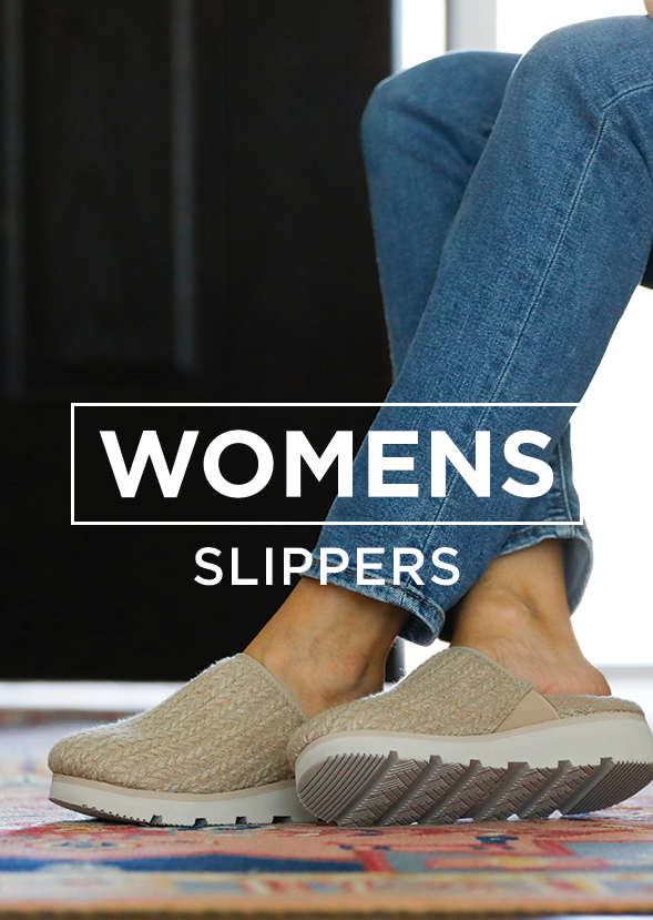 woman wearing slippers sitting on couch